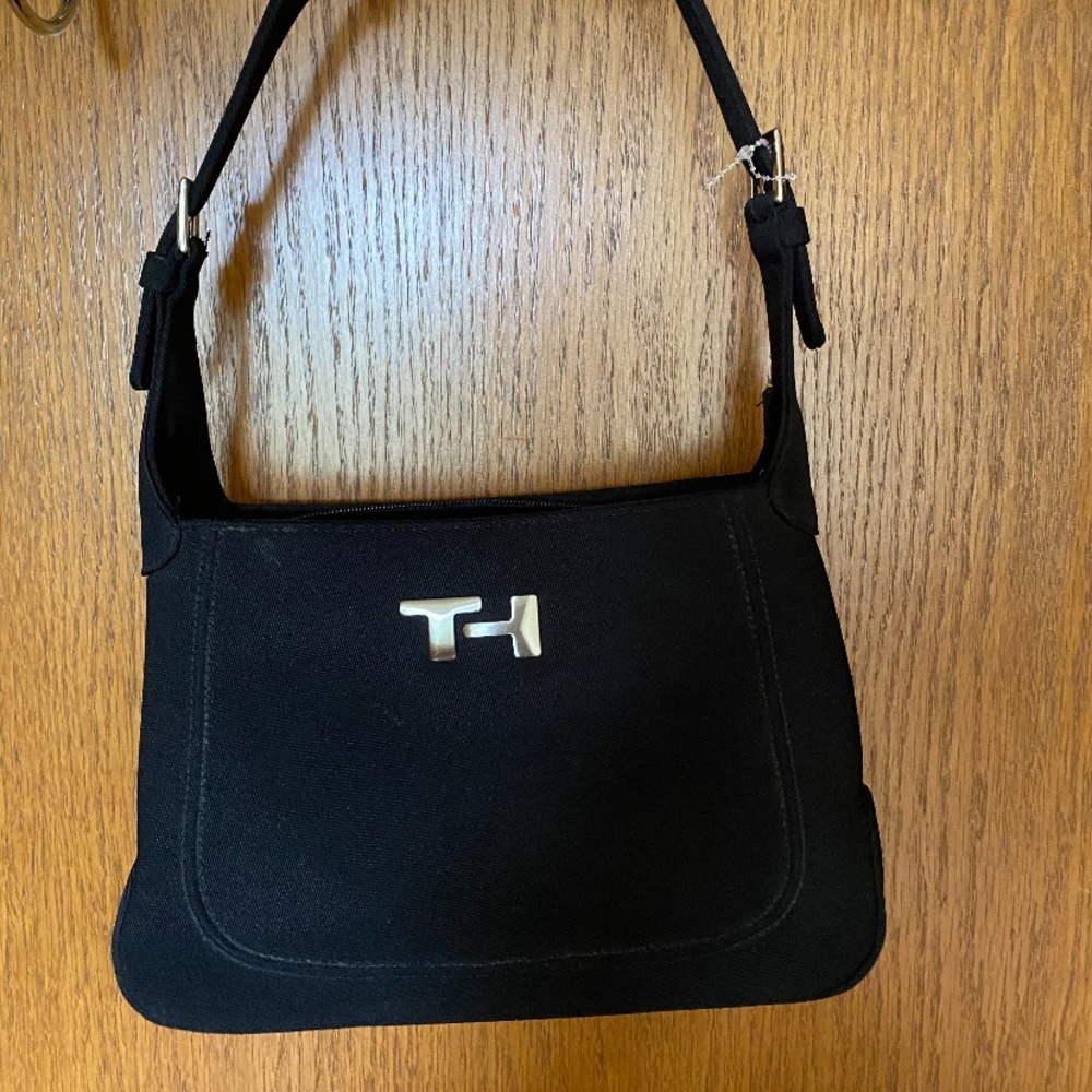 Black Tommy Hilfiger purse perfect condition.